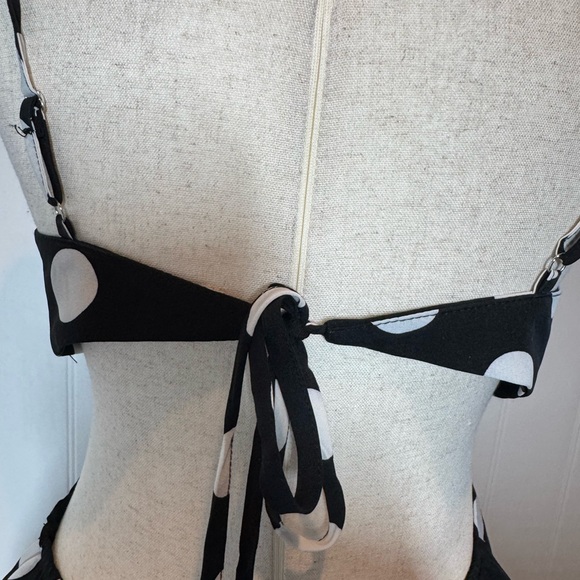 Vici Black Dress with White Polka Dots and Front Cutout - Picture 13 of 15